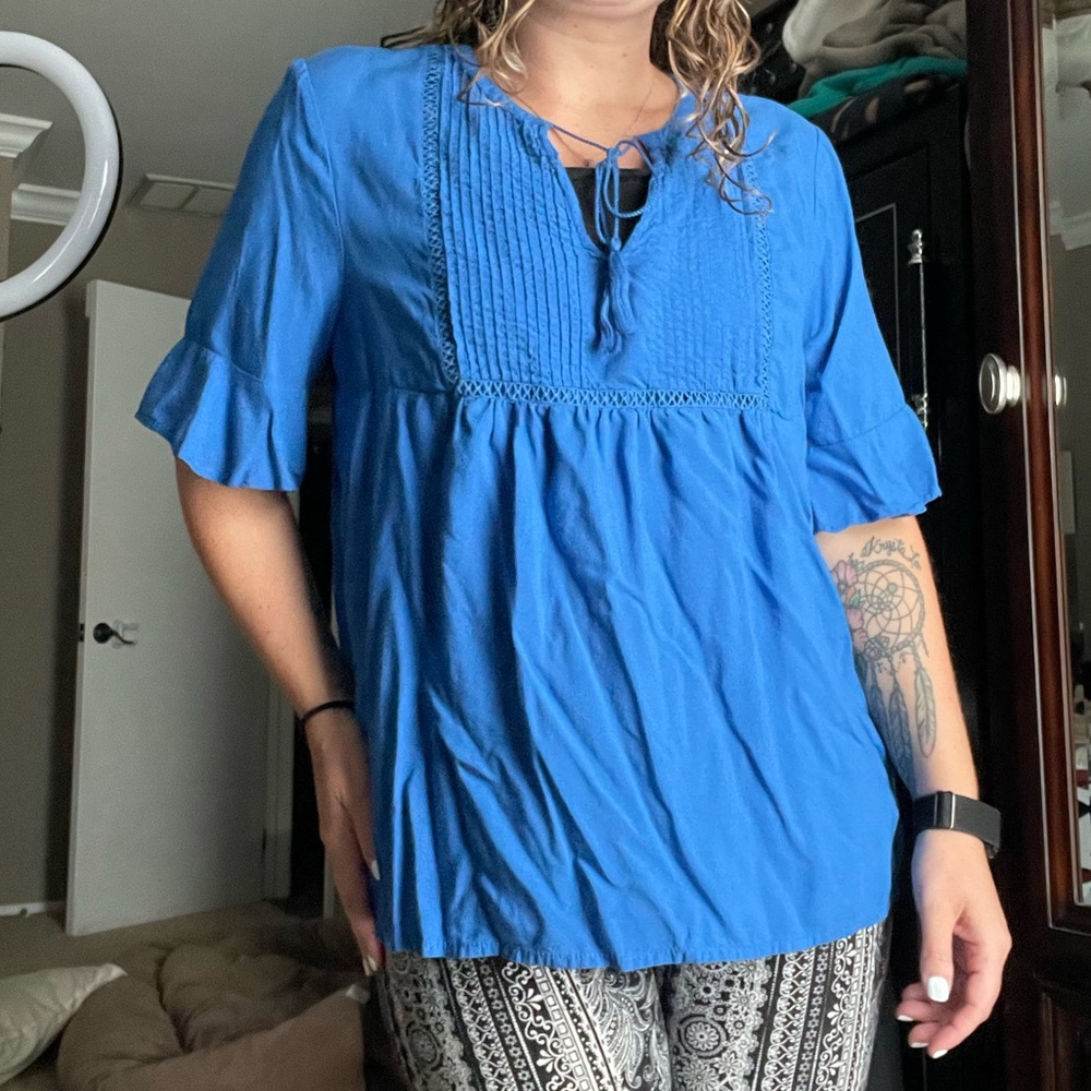 Blue bell sleeve top with tassels